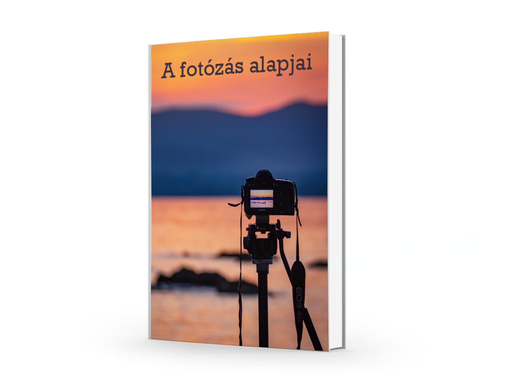 Fotózásról szóló könyv naplementés borítóval.